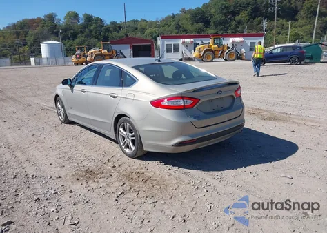 2015 Ford Fusion Energi Titanium from USA, damaged, VIN 3FA6P0SU7FR191324